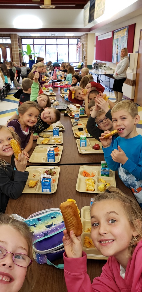 First Graders Enjoying Lunch