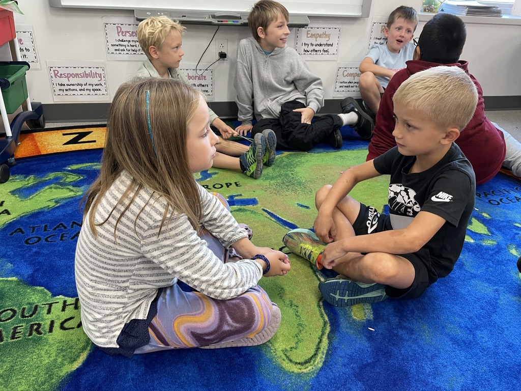 Check out these heartwarming moments as our 1st graders met their 4th-grade buddies! 